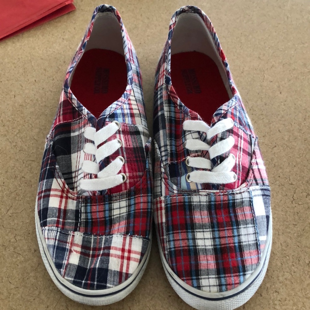 Red, white, and blue tennis shoes.